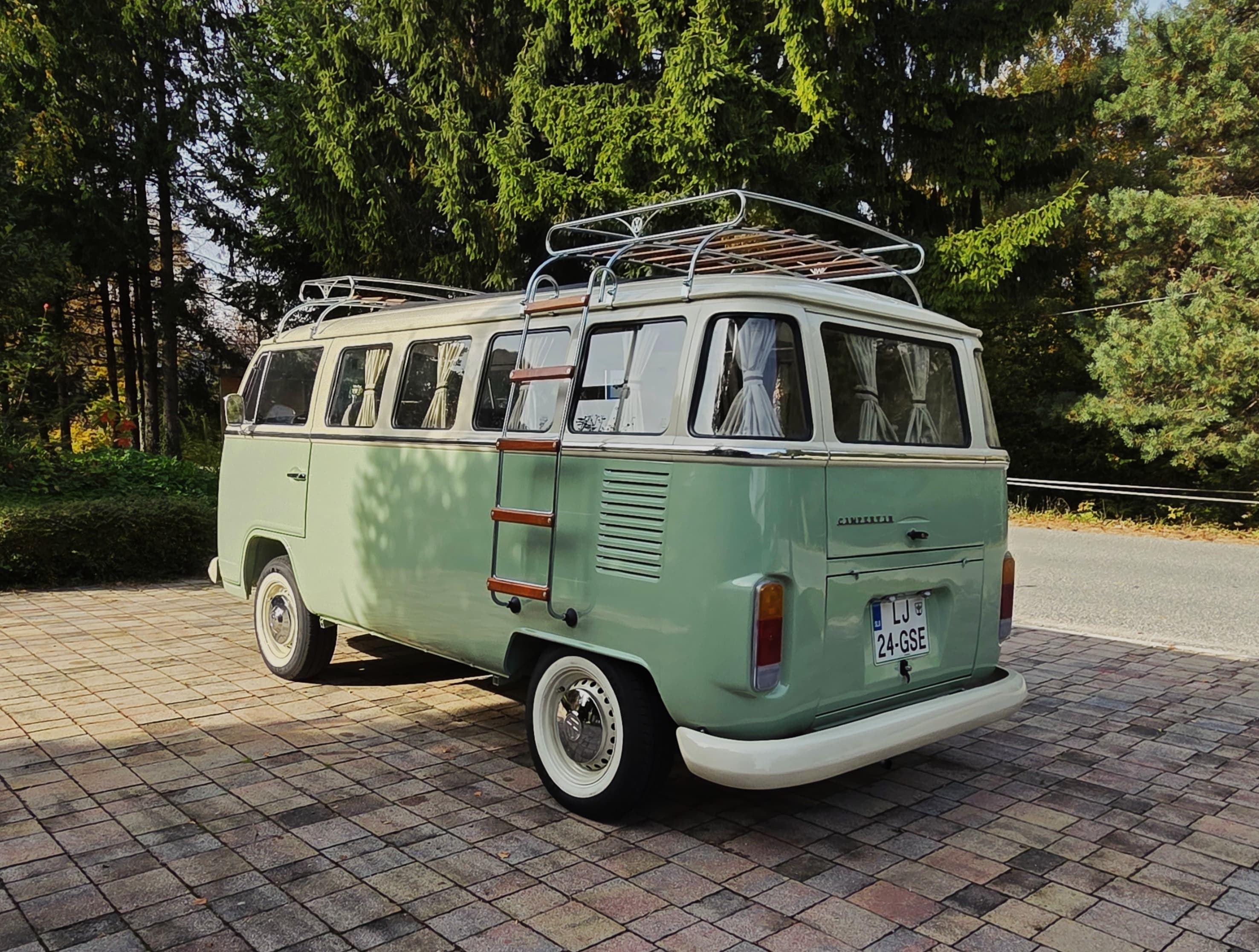 Classic VW Bully T2 in great condition in green and beige.