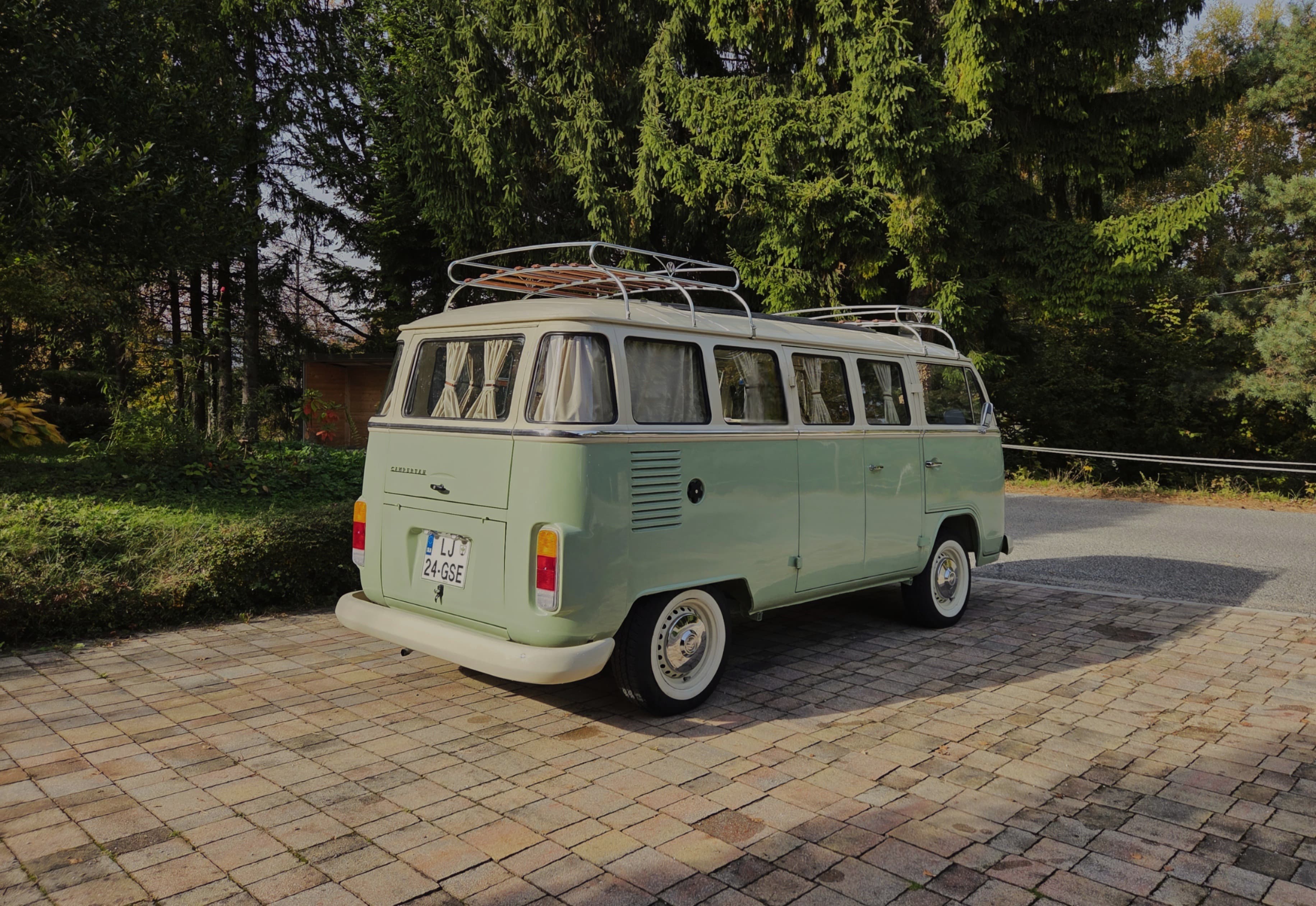 Classic VW Bully T2 in great condition in green and beige.