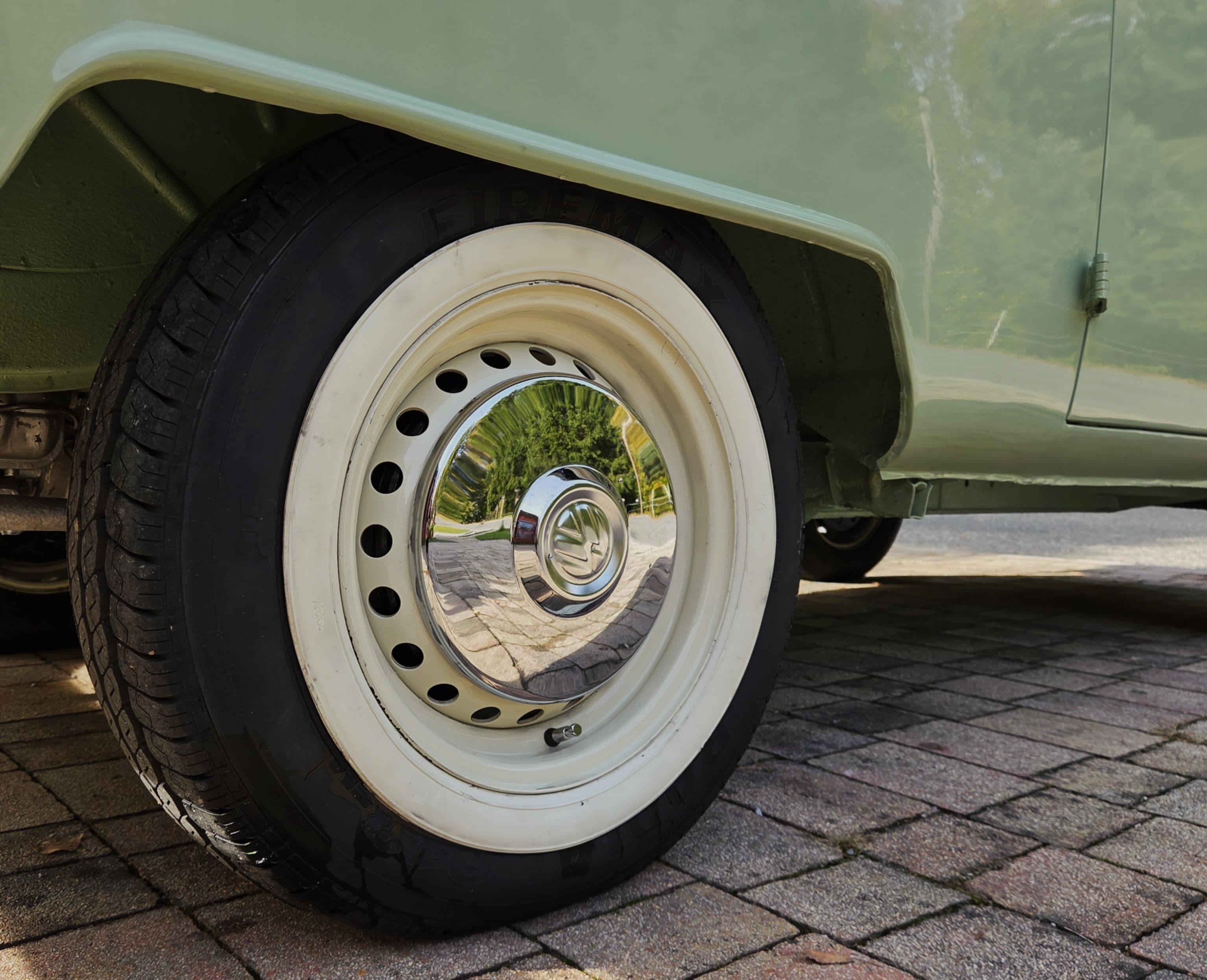 Classic VW Bully T2 in great condition in green and beige.