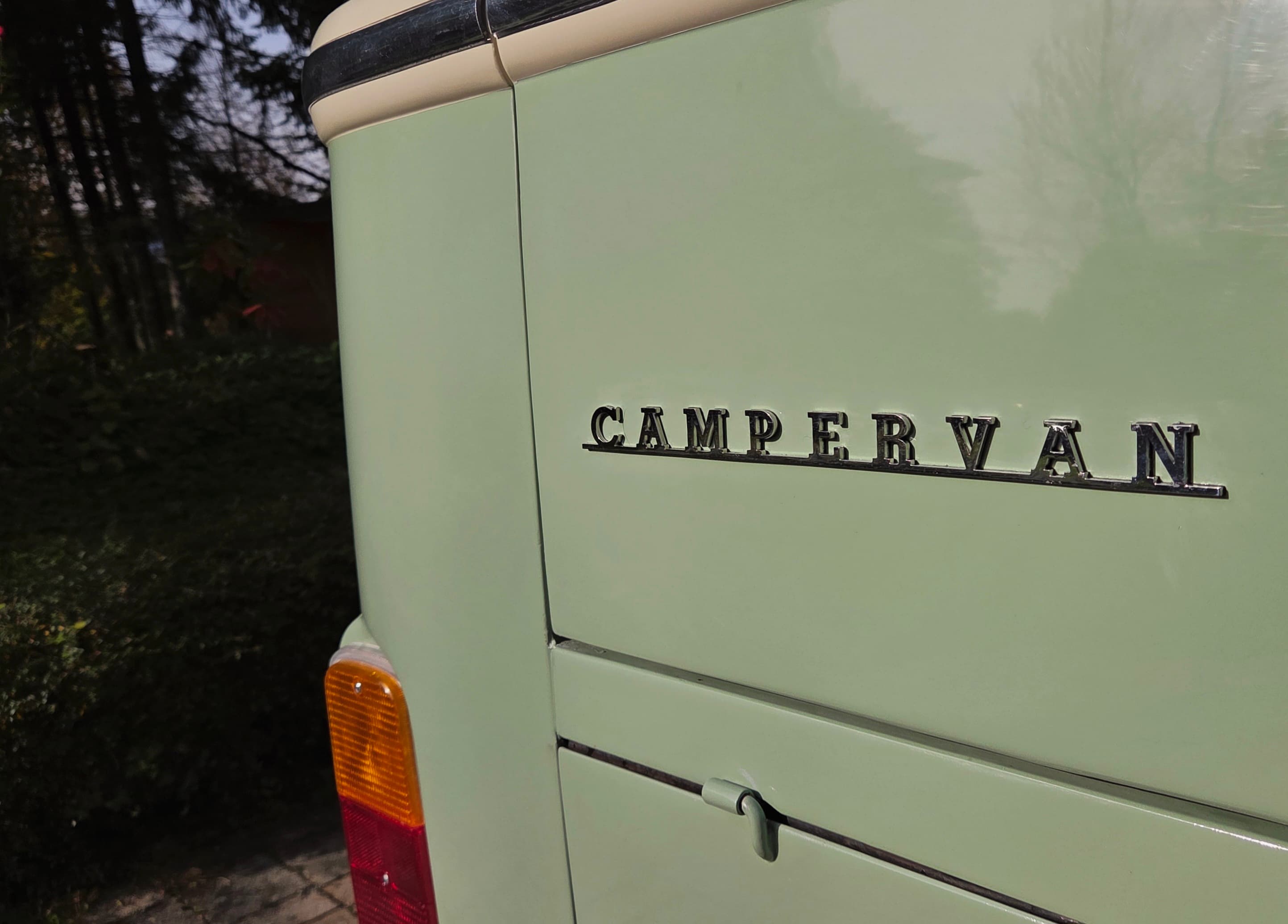 Classic VW Bully T2 in great condition in green and beige.