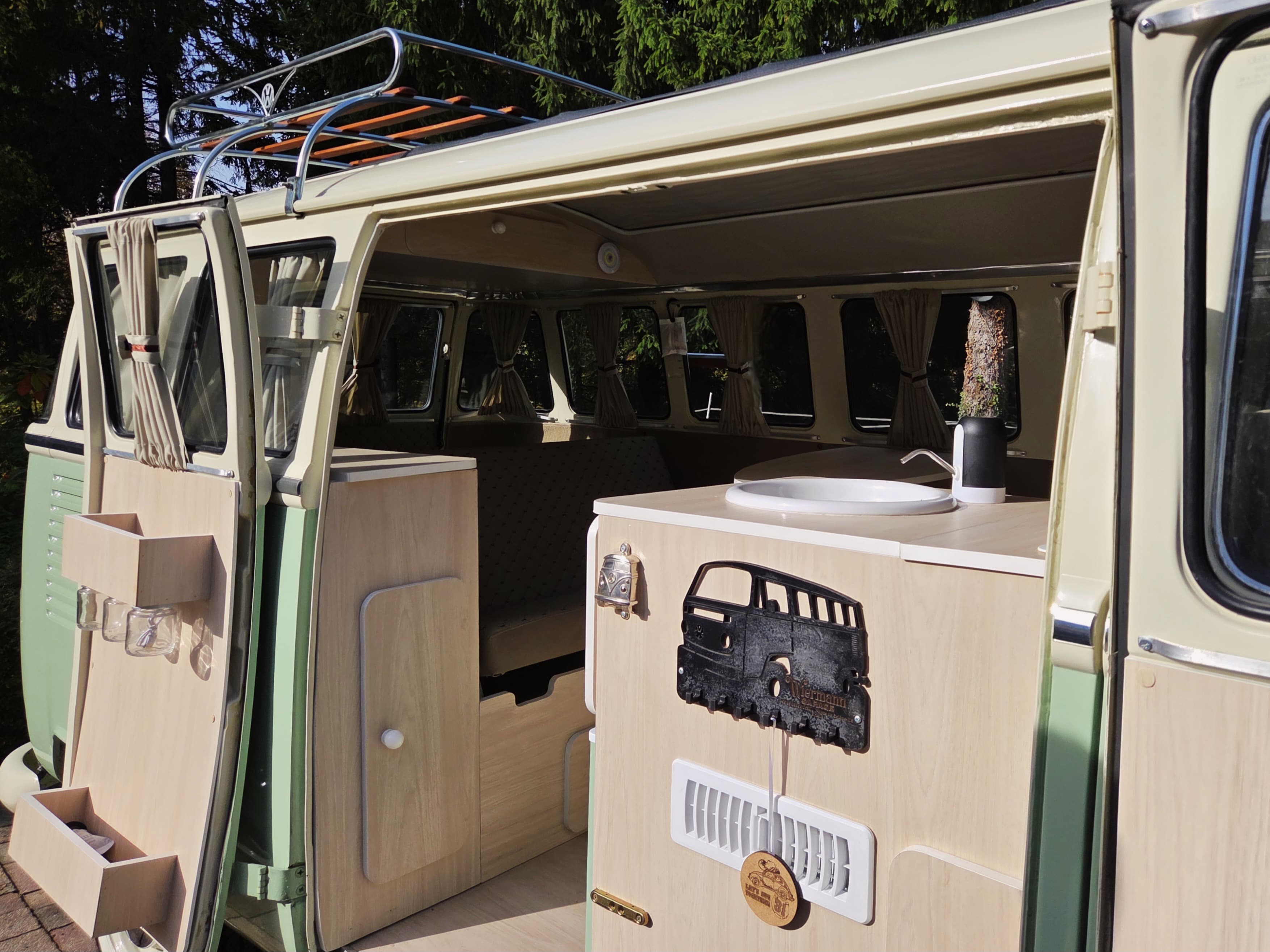 Classic VW Bully T2 in great condition in green and beige.