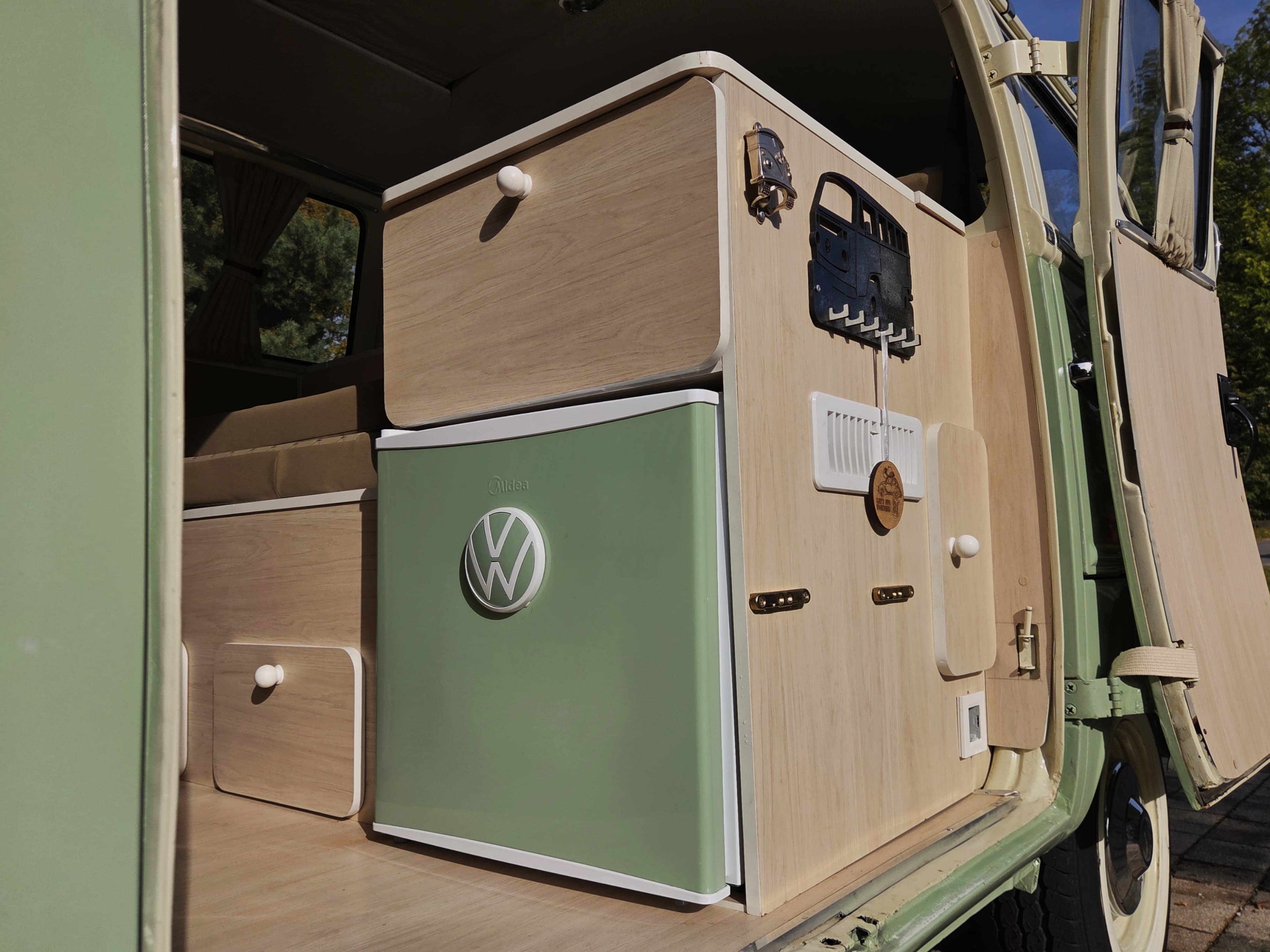 Classic VW Bully T2 in great condition in green and beige.