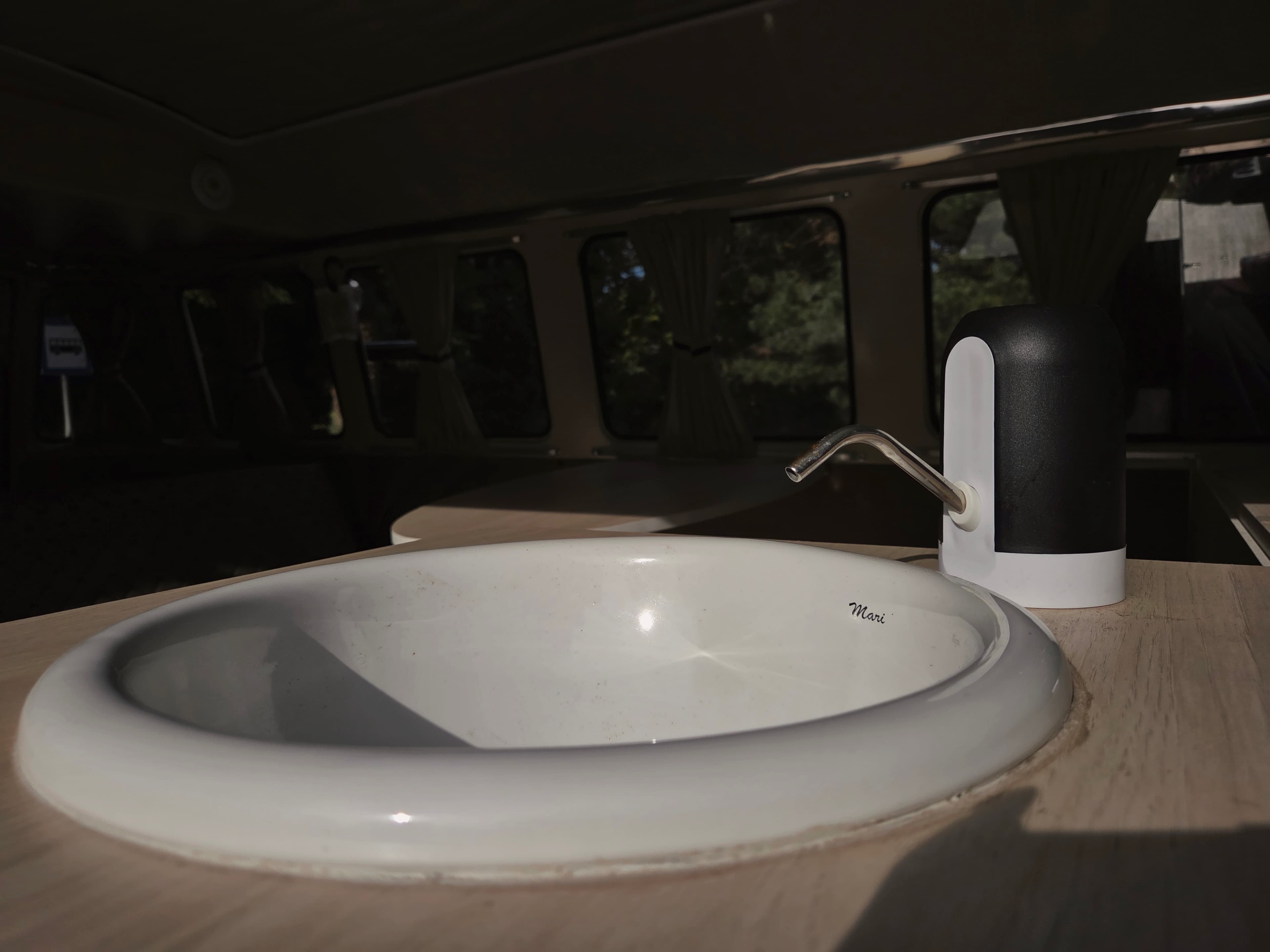 Classic VW Bully T2 in great condition in green and beige.