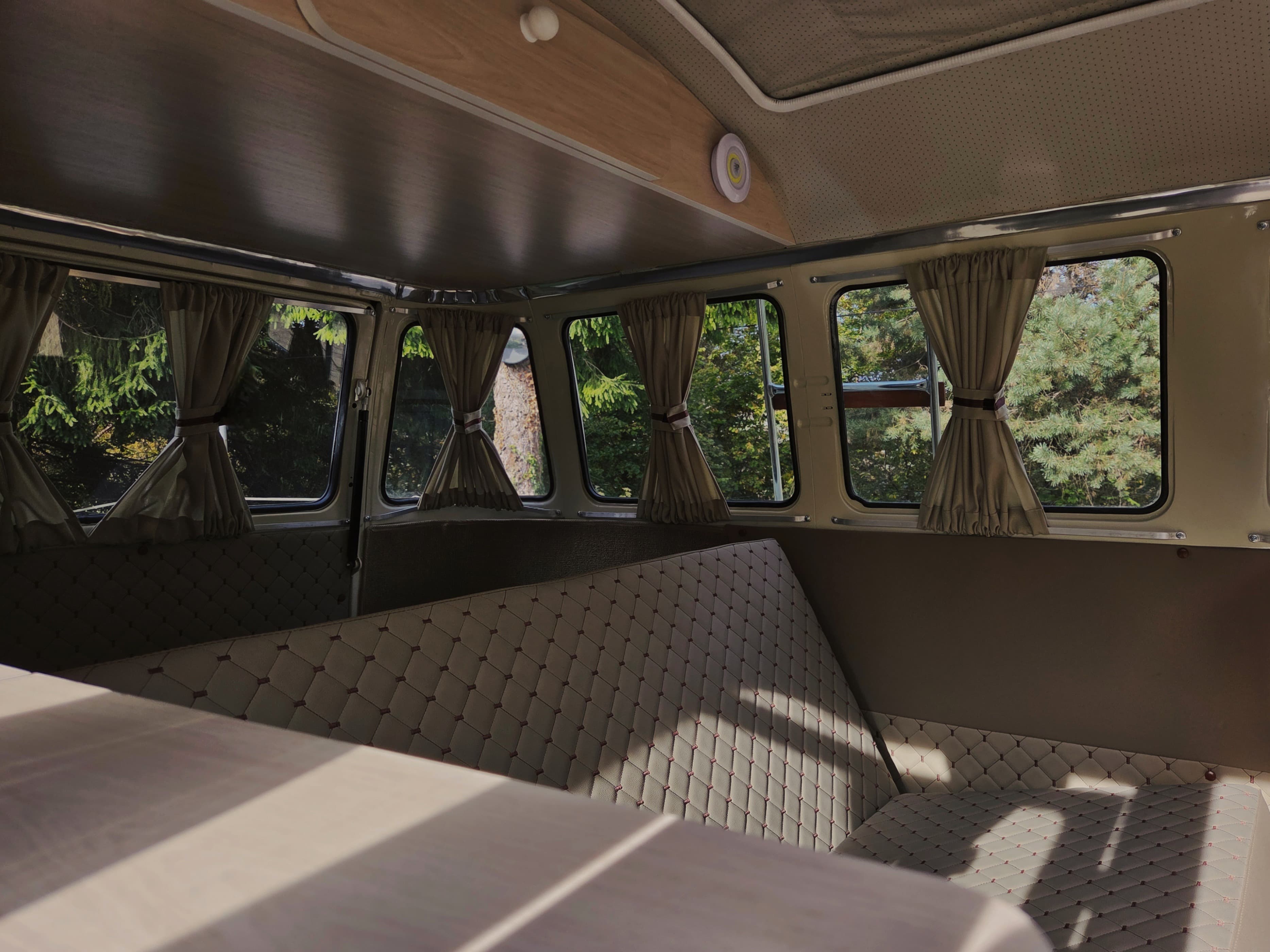 Classic VW Bully T2 in great condition in green and beige.