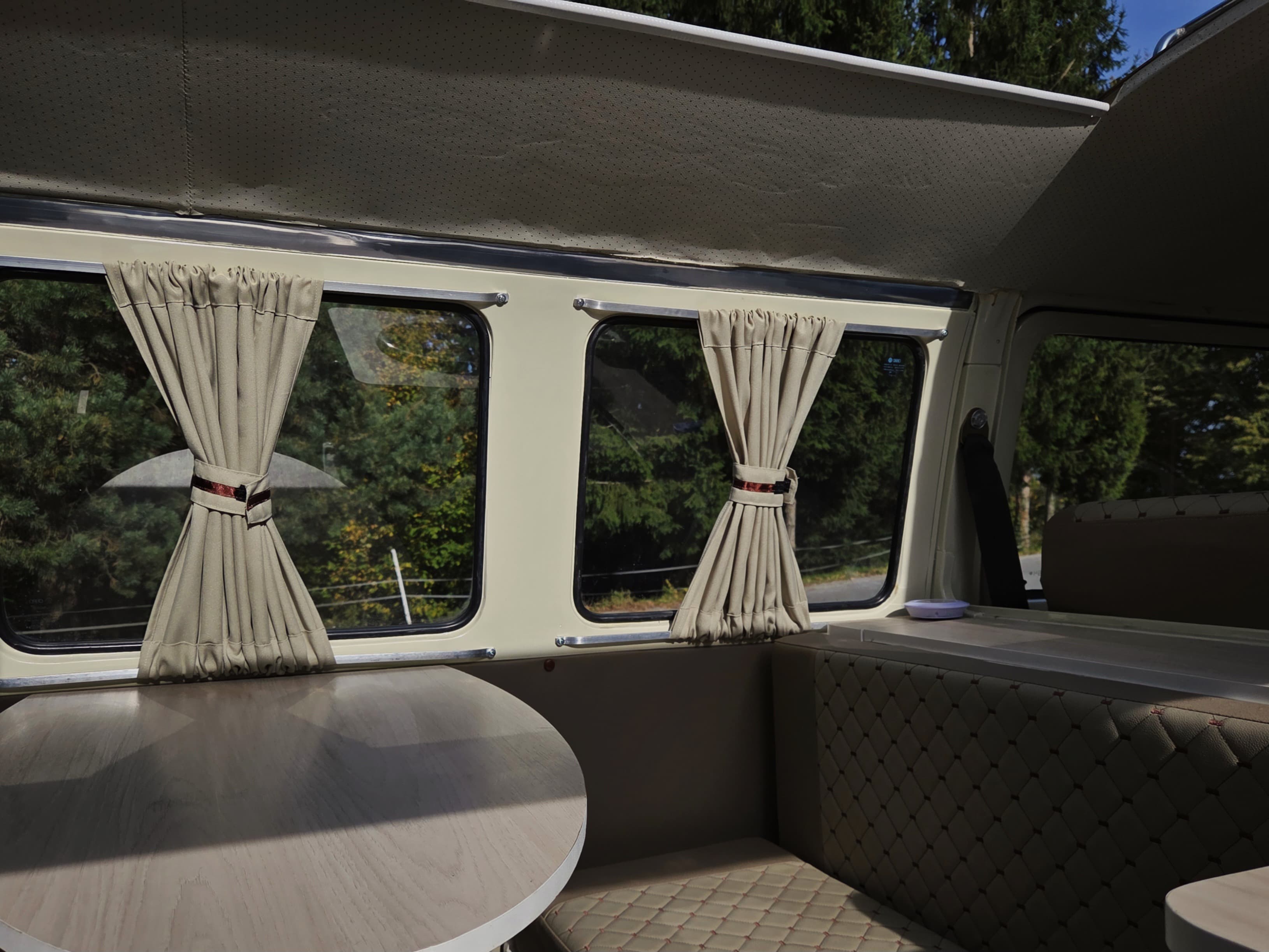 Classic VW Bully T2 in great condition in green and beige.