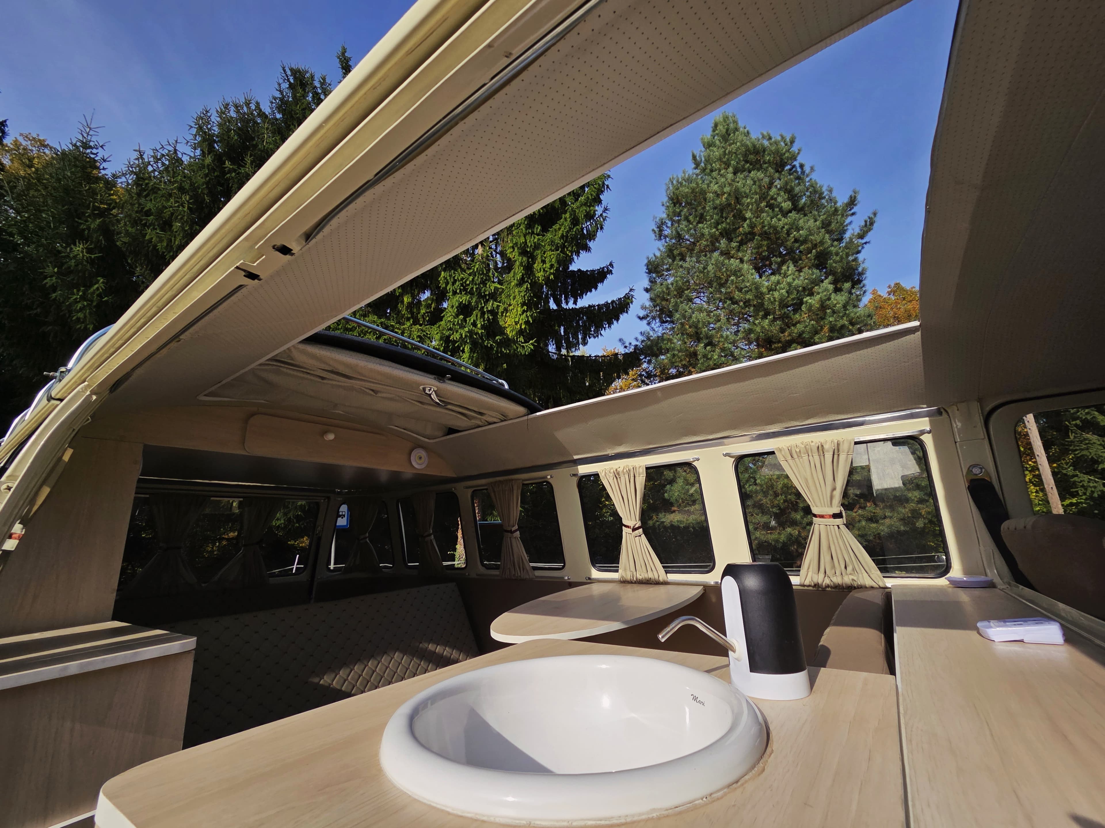 Classic VW Bully T2 in great condition in green and beige.