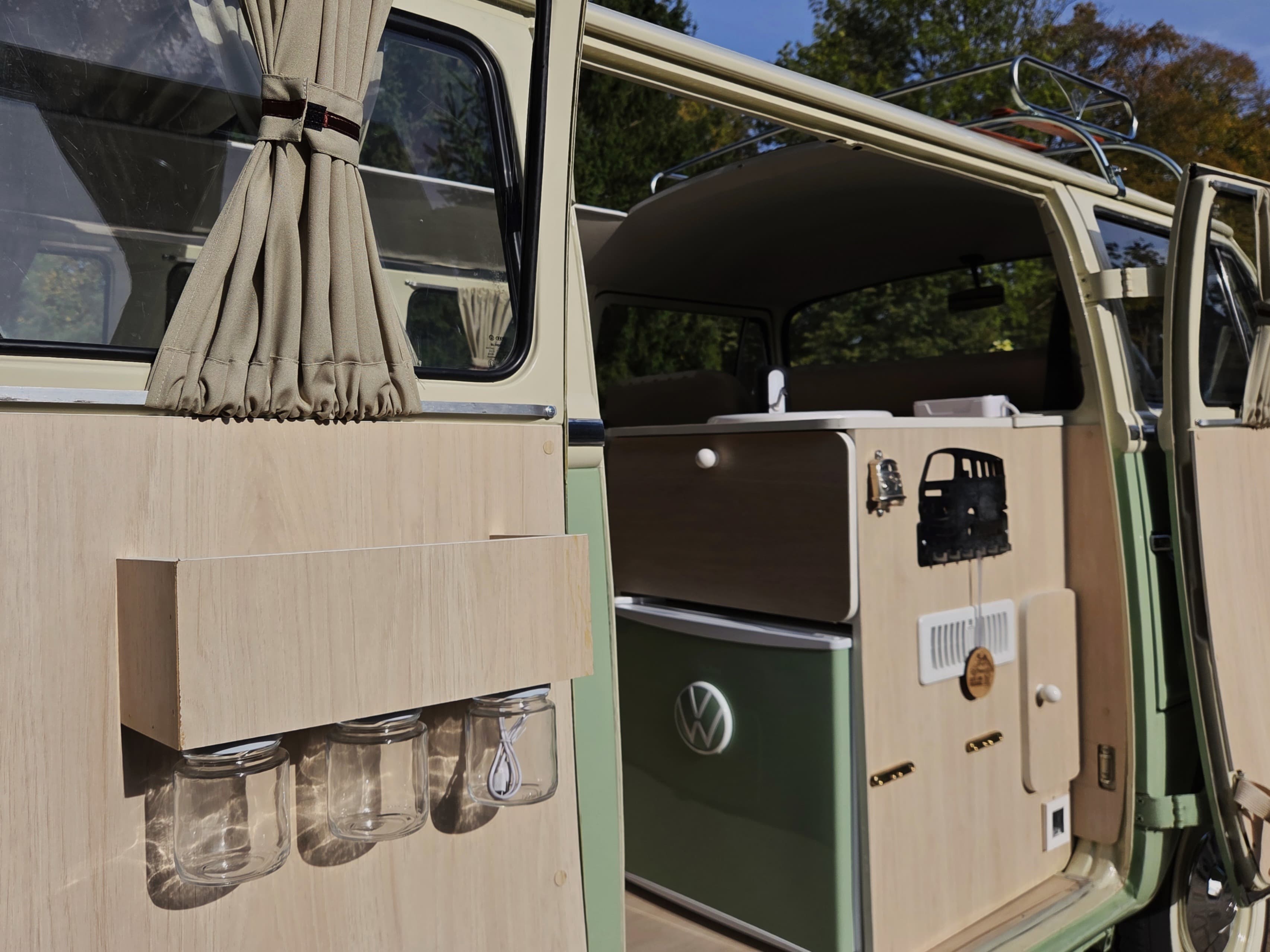 Classic VW Bully T2 in great condition in green and beige.