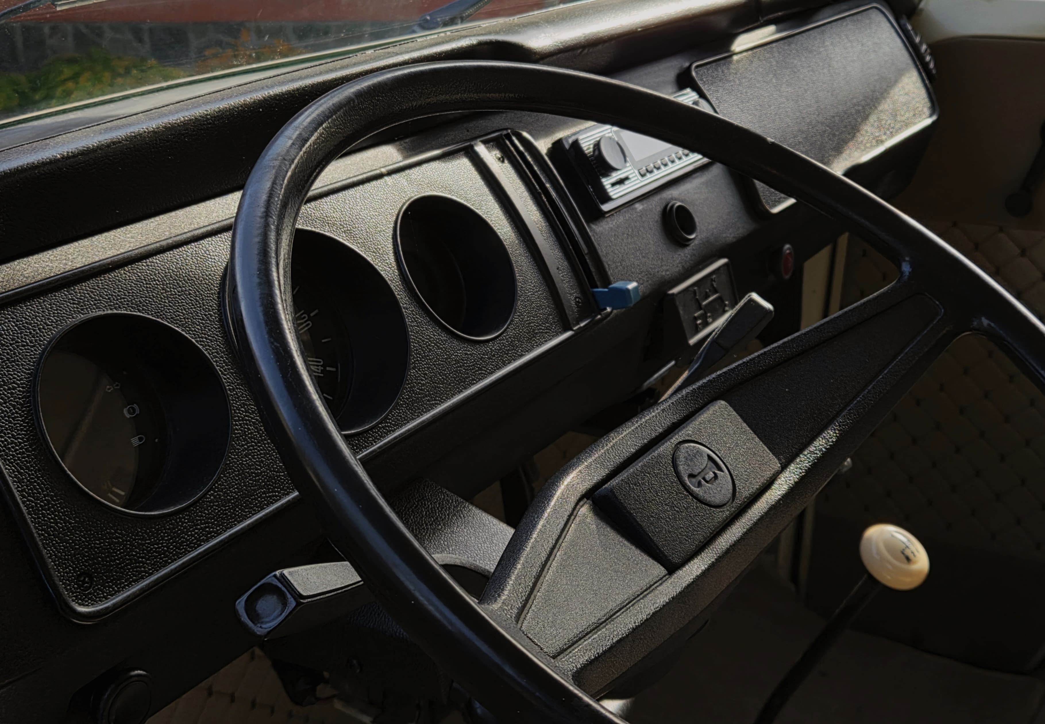 Classic VW Bully T2 in great condition in green and beige.