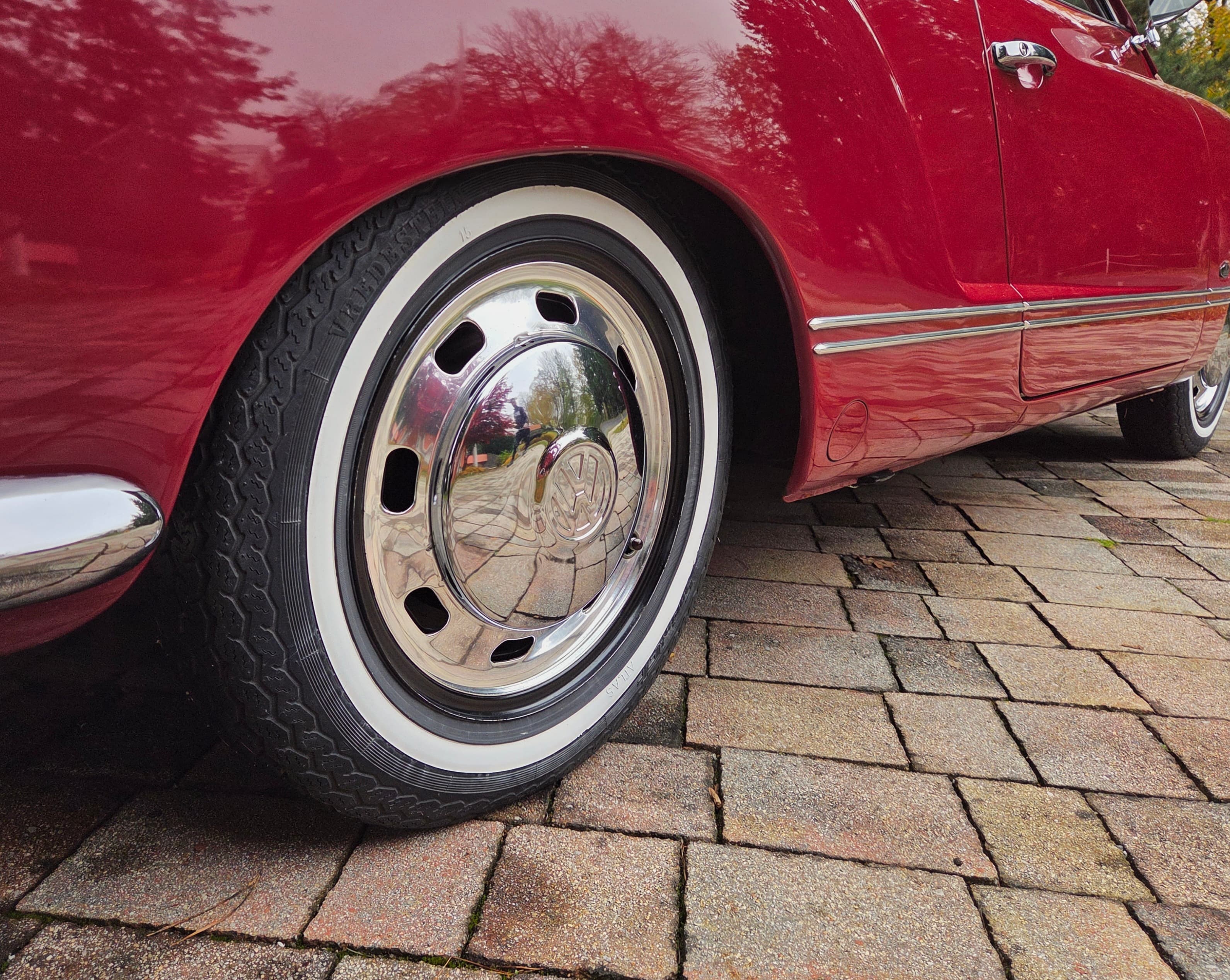 Stunning VW Karmann Ghia Coupe in cherry red with original equipment.