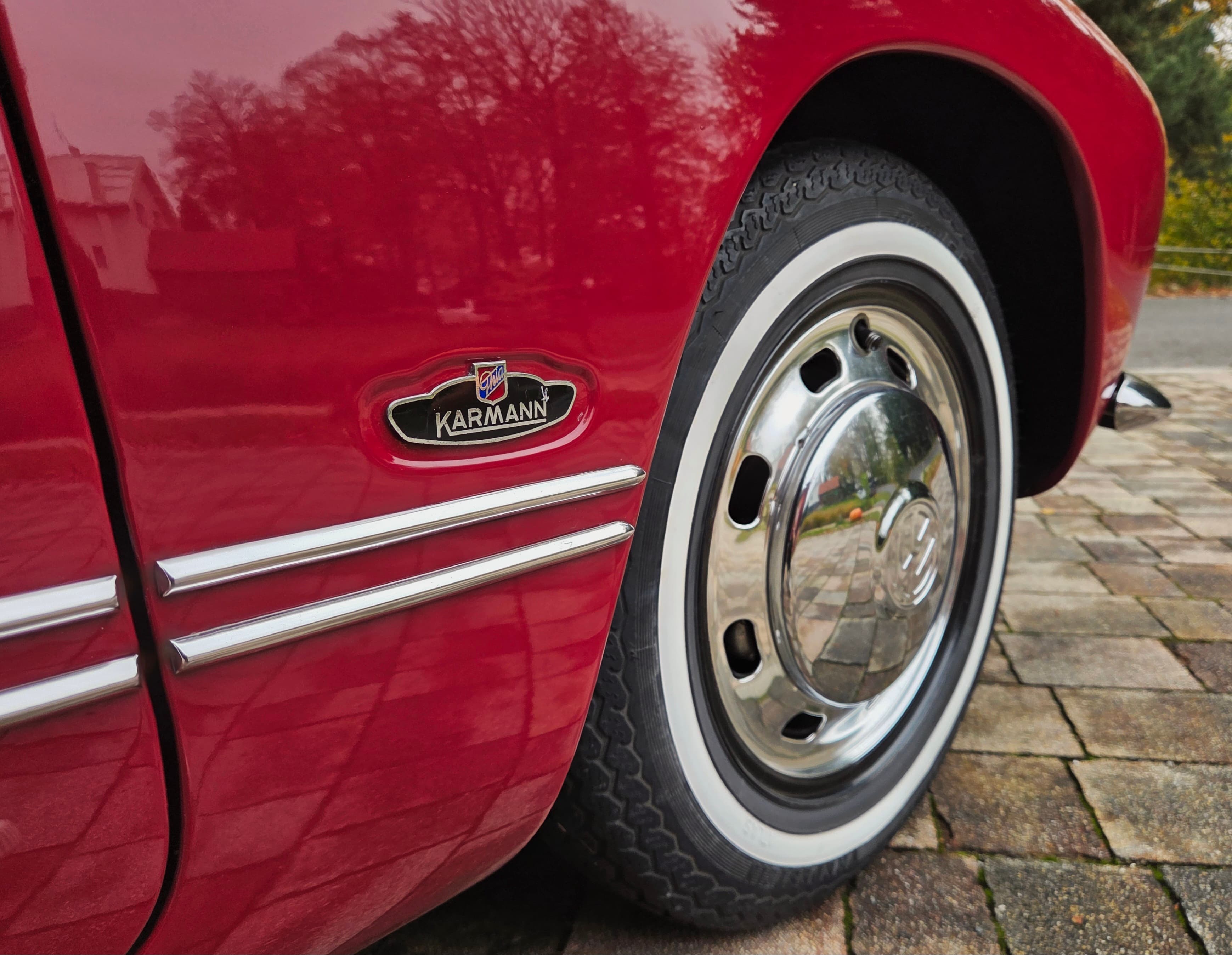 Stunning VW Karmann Ghia Coupe in cherry red with original equipment.