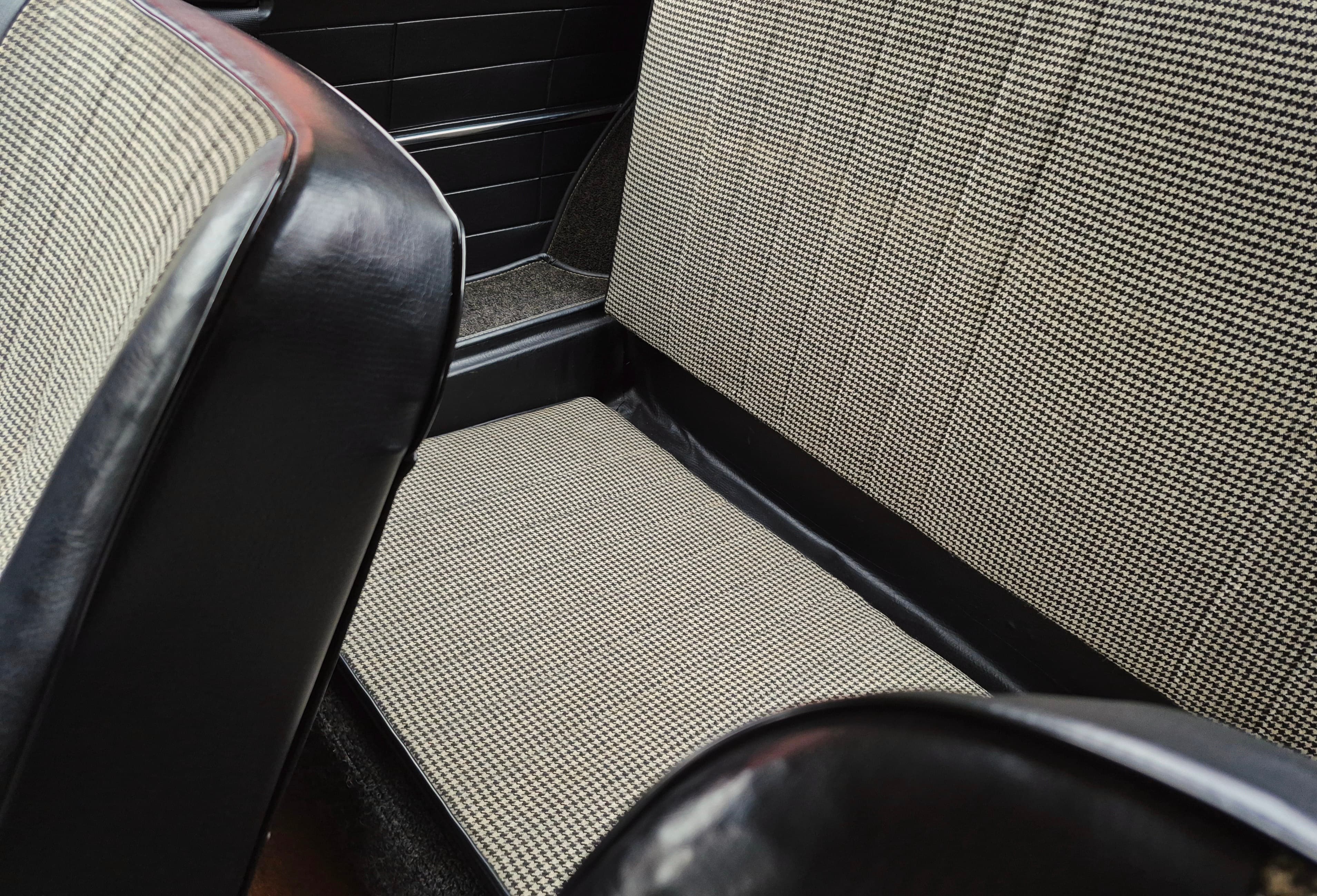 Stunning VW Karmann Ghia Coupe in cherry red with original equipment.