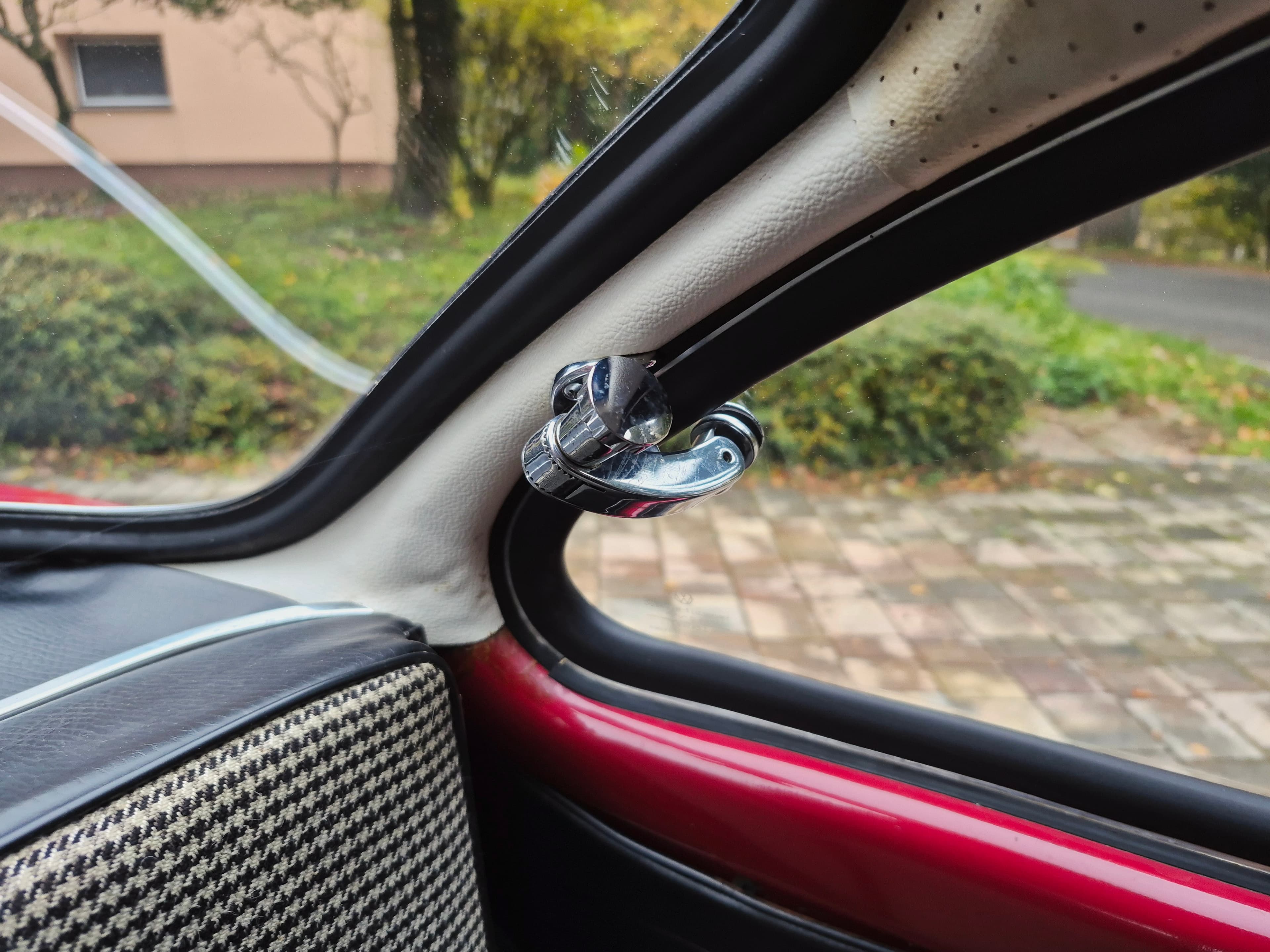 Stunning VW Karmann Ghia Coupe in cherry red with original equipment.