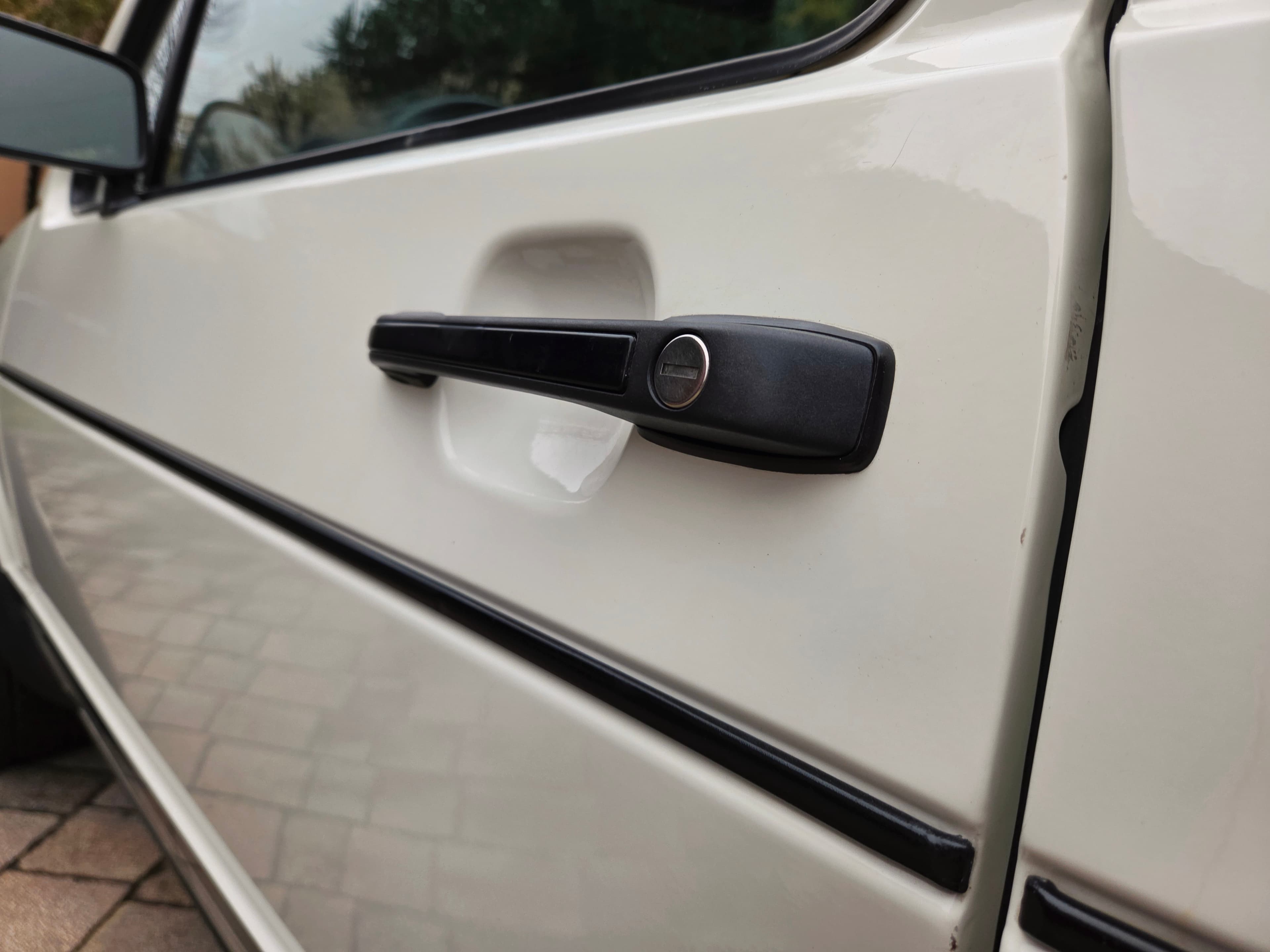 Classic VW Golf 1 GTI in Alpine White with sport wheels