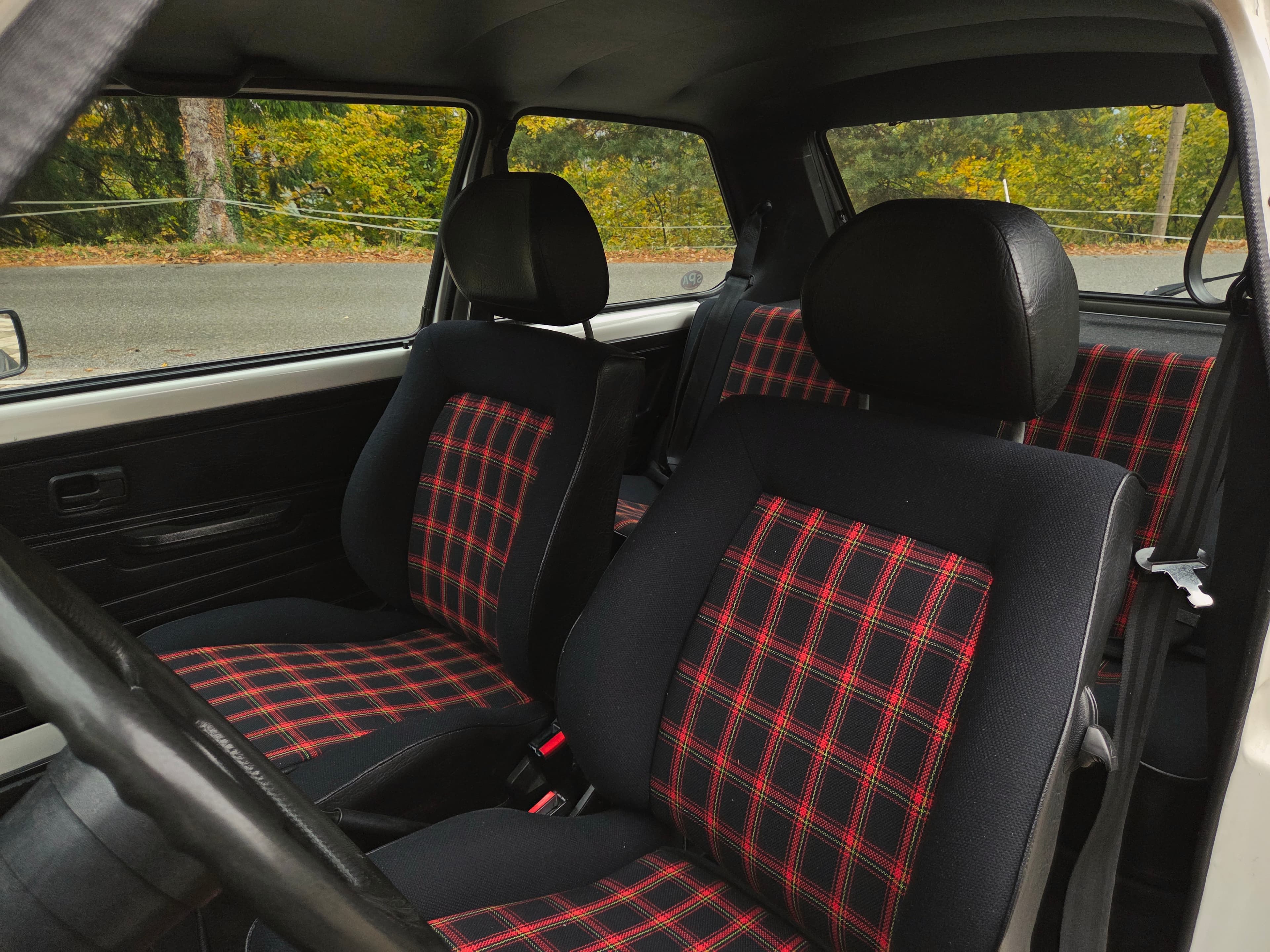 Classic VW Golf 1 GTI in Alpine White with sport wheels