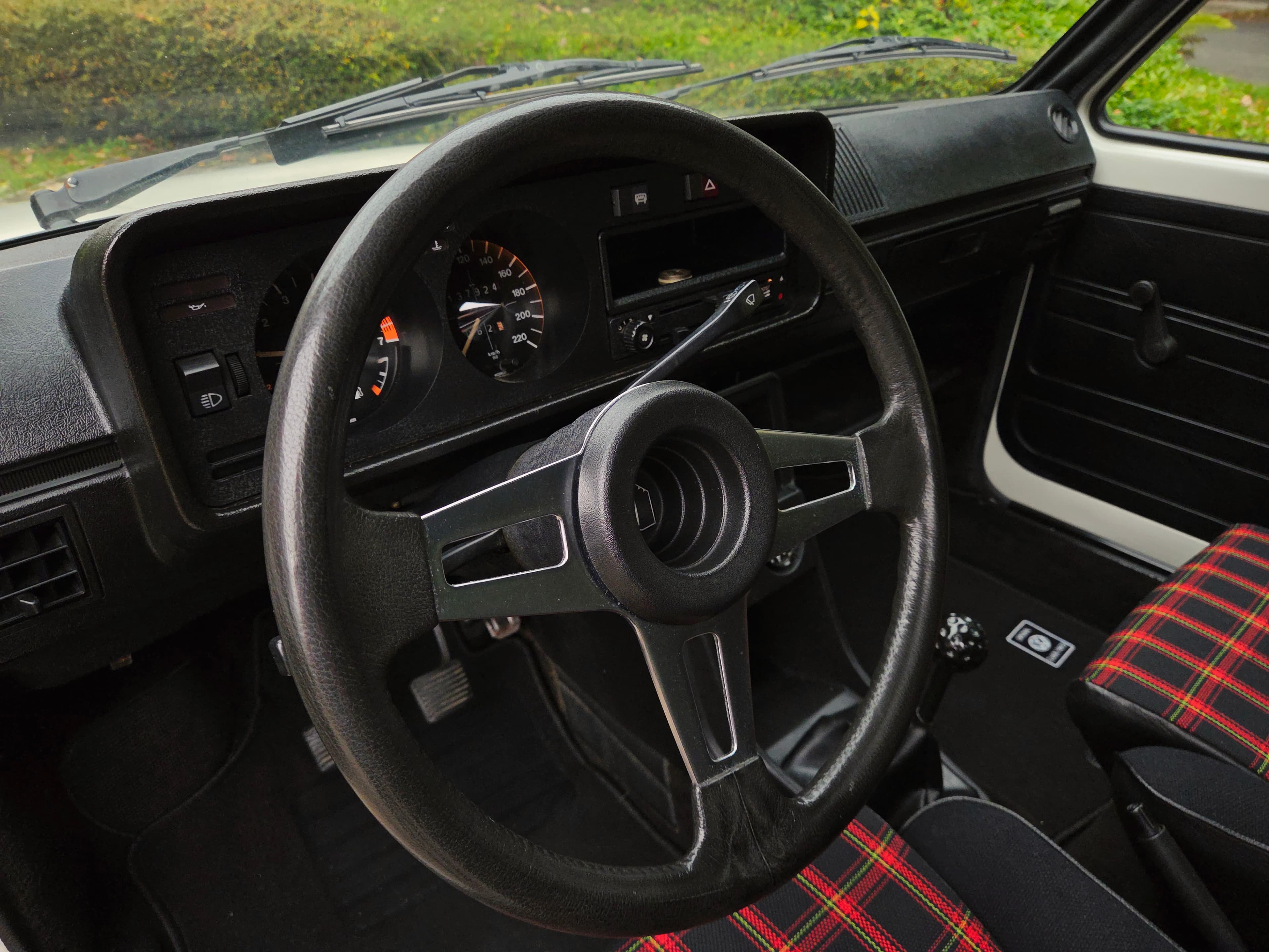 Classic VW Golf 1 GTI in Alpine White with sport wheels