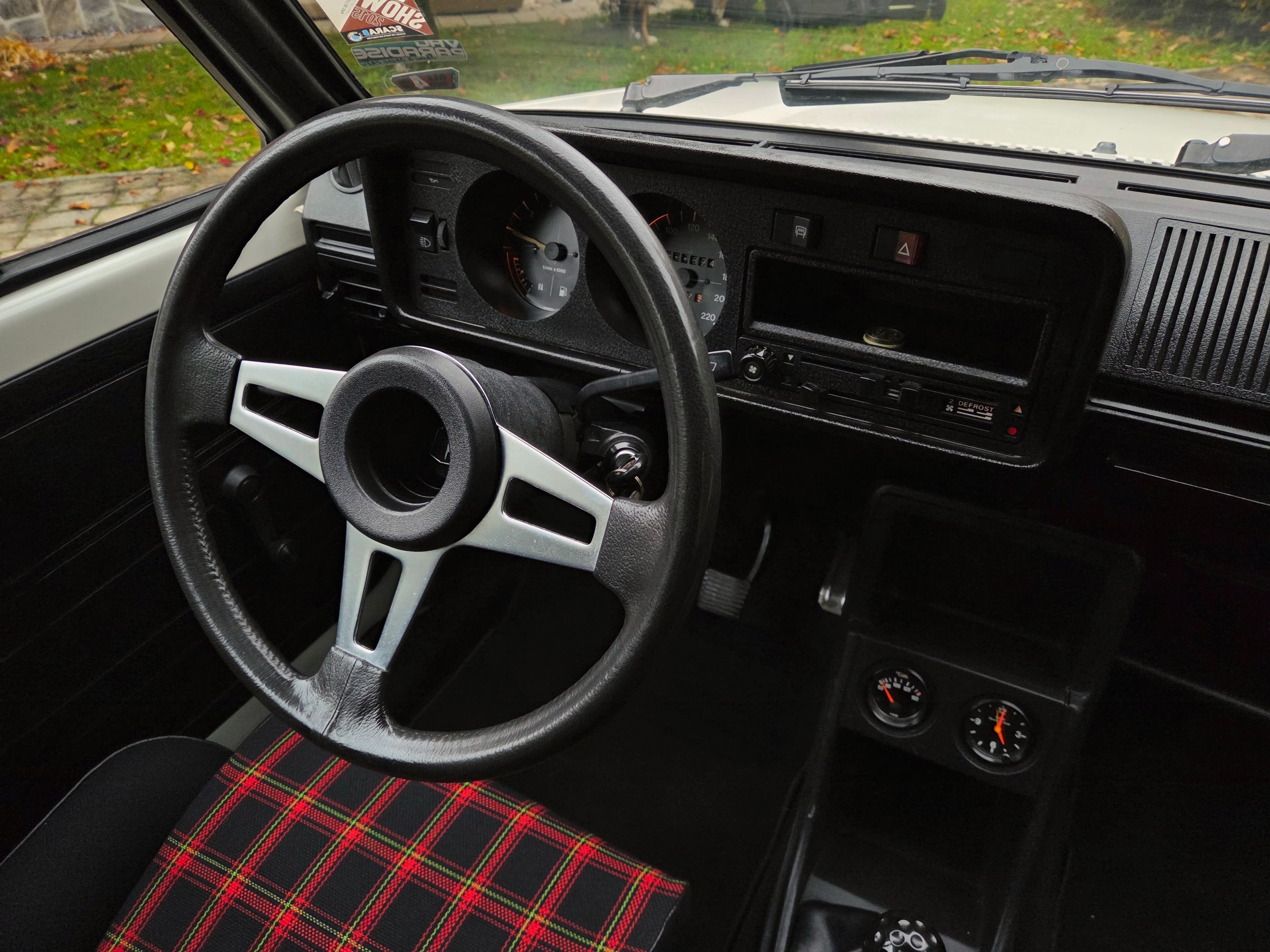 Classic VW Golf 1 GTI in Alpine White with sport wheels