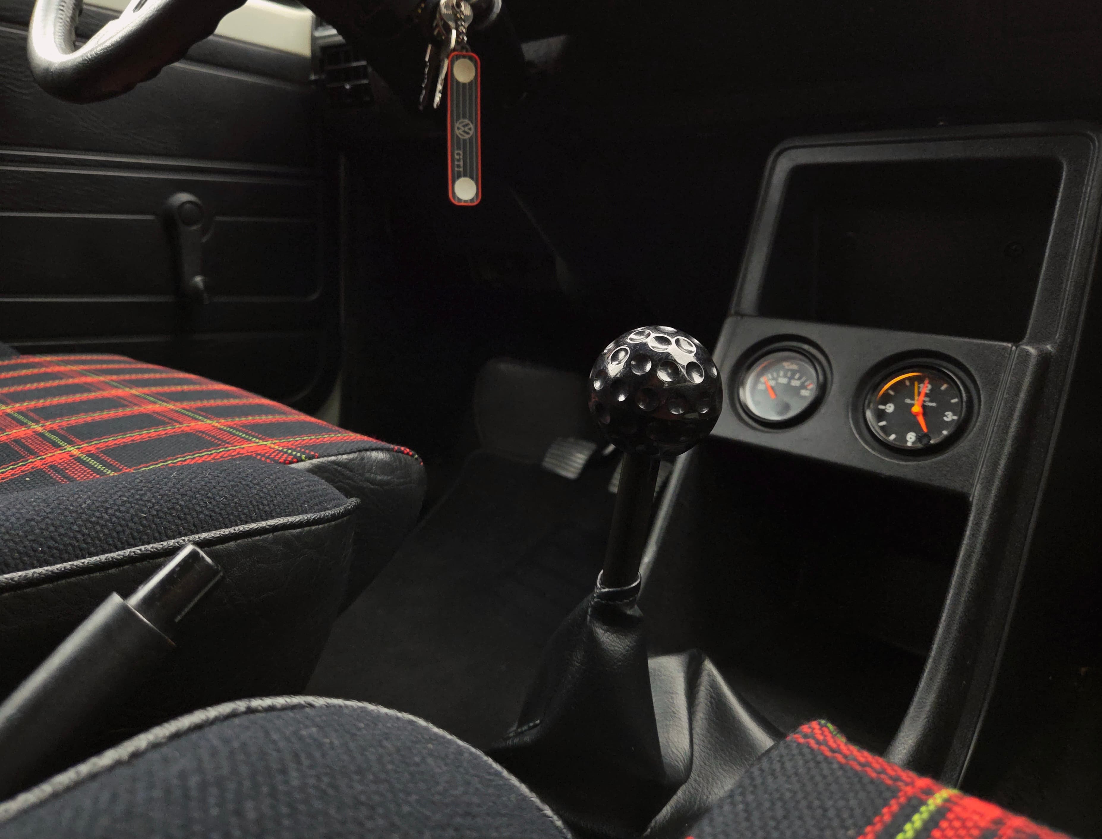 Classic VW Golf 1 GTI in Alpine White with sport wheels