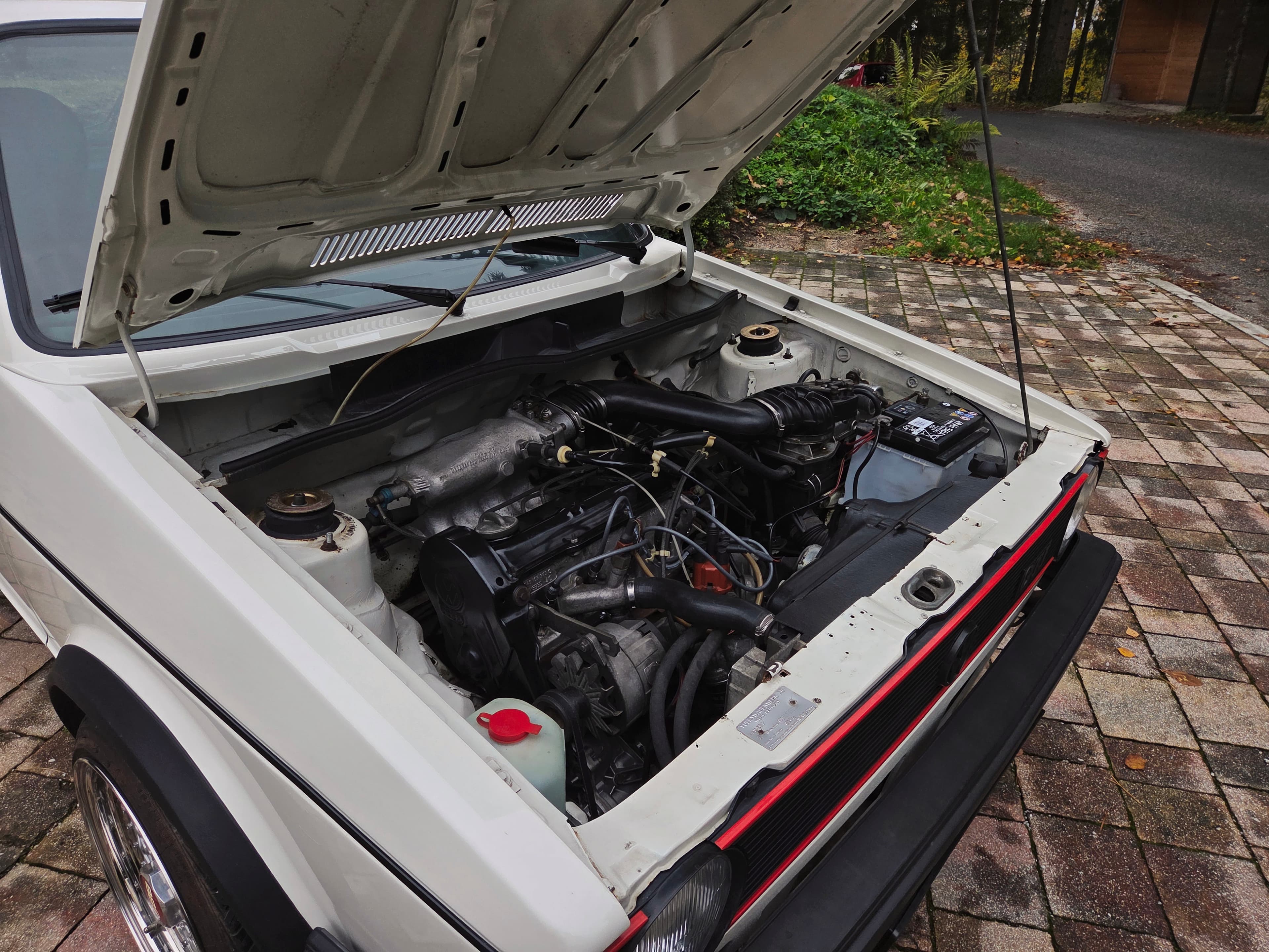 Classic VW Golf 1 GTI in Alpine White with sport wheels
